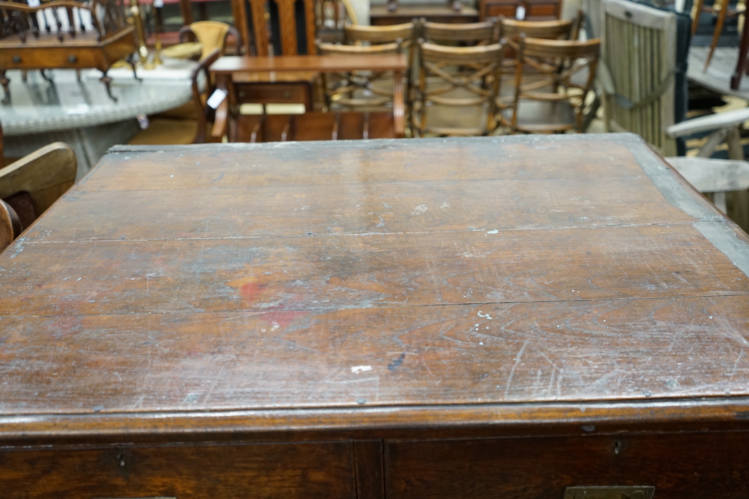 An early 19th century teak military chest with twin brass side handles, width 89cm, depth 62cm, height 117cm